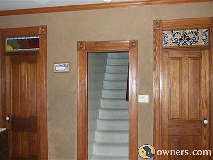 Wood trim; Stained glass transom panels