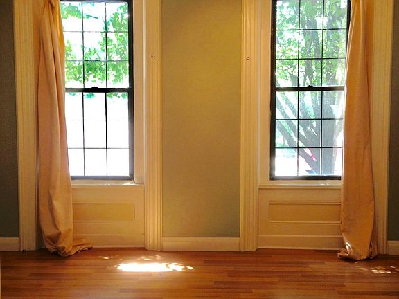 Living room with large windows lots of sunshine
