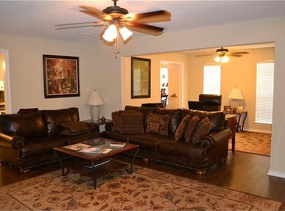 Den with Wood Laminate Floors.