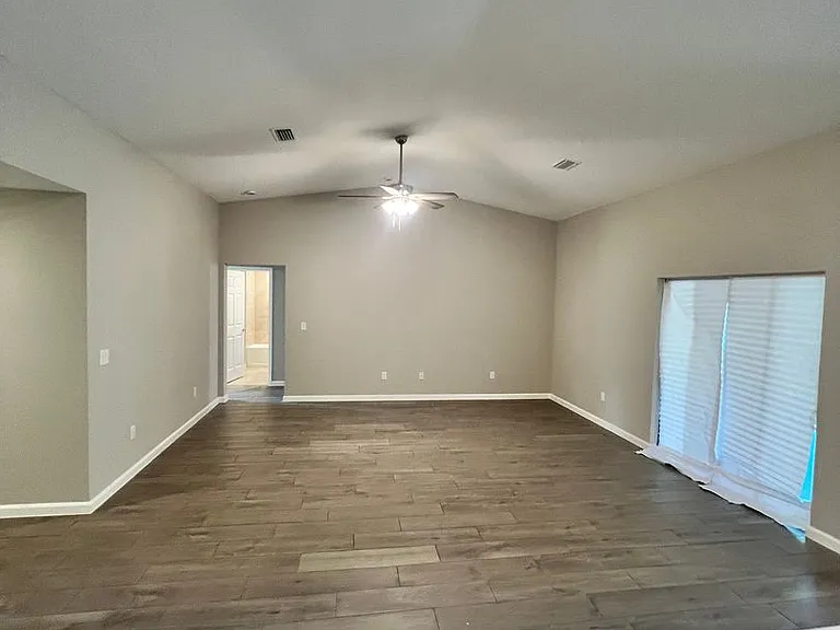 5951 NW Baynard Dr — Photo 17