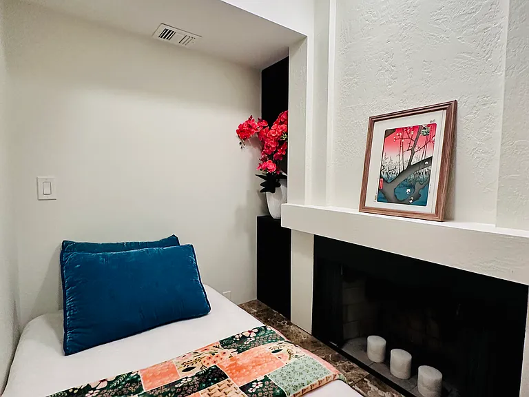 Cozy, private napping room attached to the master bedroom-creating a personal sanctuary and dedicated space for rest and relaxation