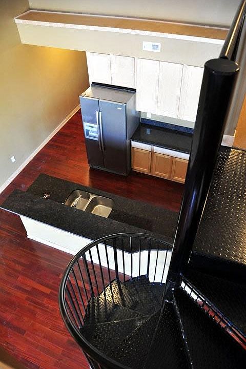 Please note: the kitchen cabinets are not white. This is li