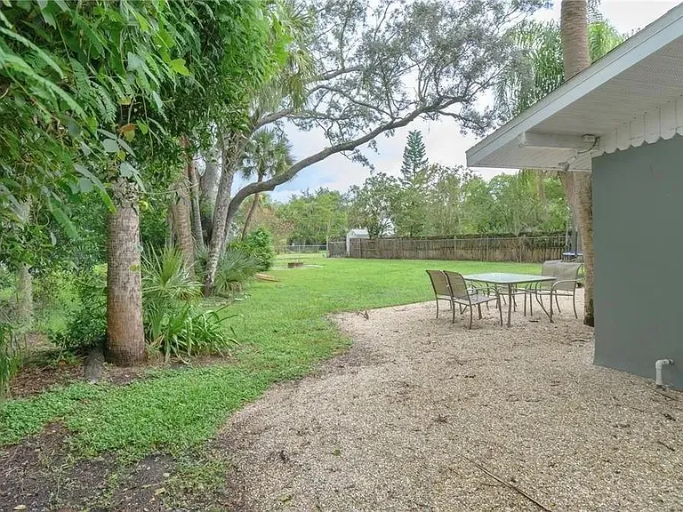Fenced in backyard on half an acre