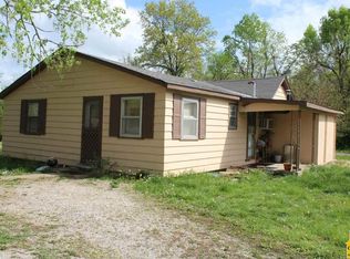 410 S 4th St, Deepwater, MO 64740