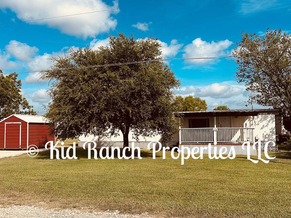 Front of Home With Convenient Storage Shed...