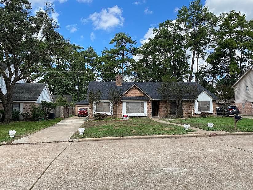 Front of house and driveway.