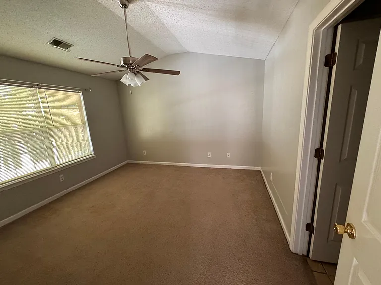Master Bedroom with Vaulted Ceilings and new fan