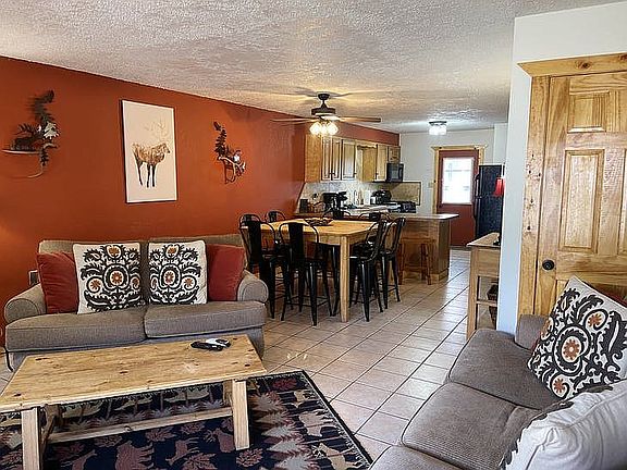 Open living, dining, kitchen