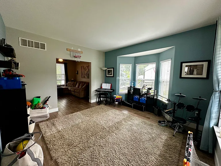Living room used as a music/play room.