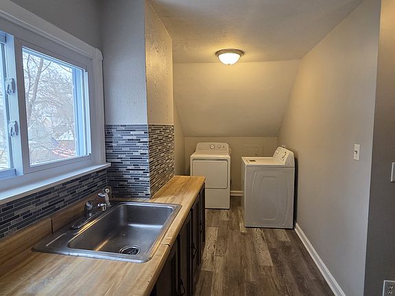 The washer and dryer are off the kitchen!
