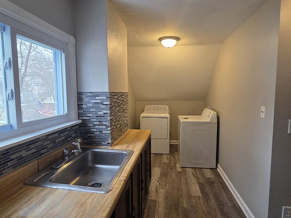 The washer and dryer are off the kitchen!