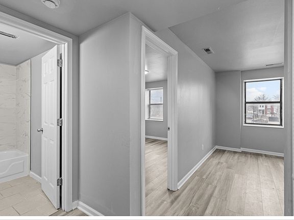 Living room, bedroom & bath view