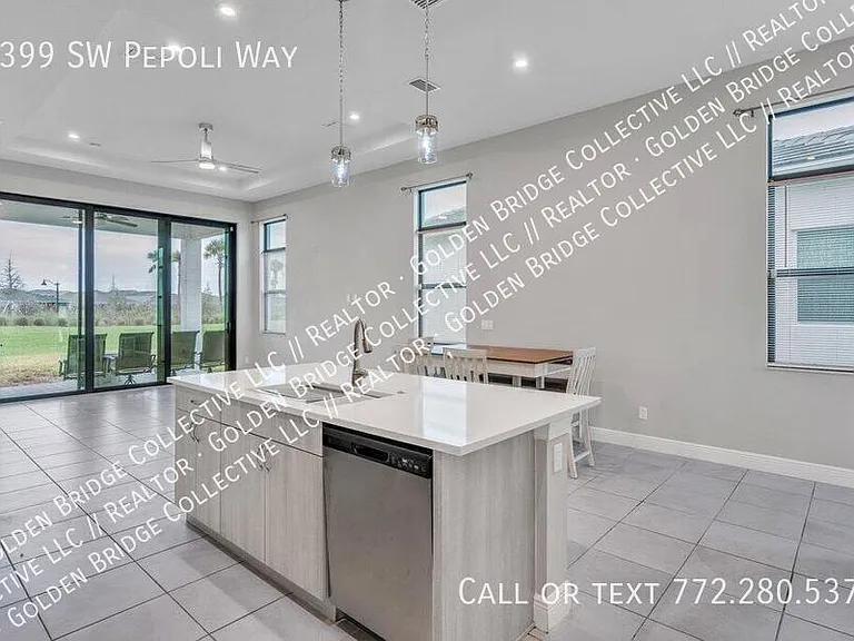9399 SW Pepoli Way — Photo 1