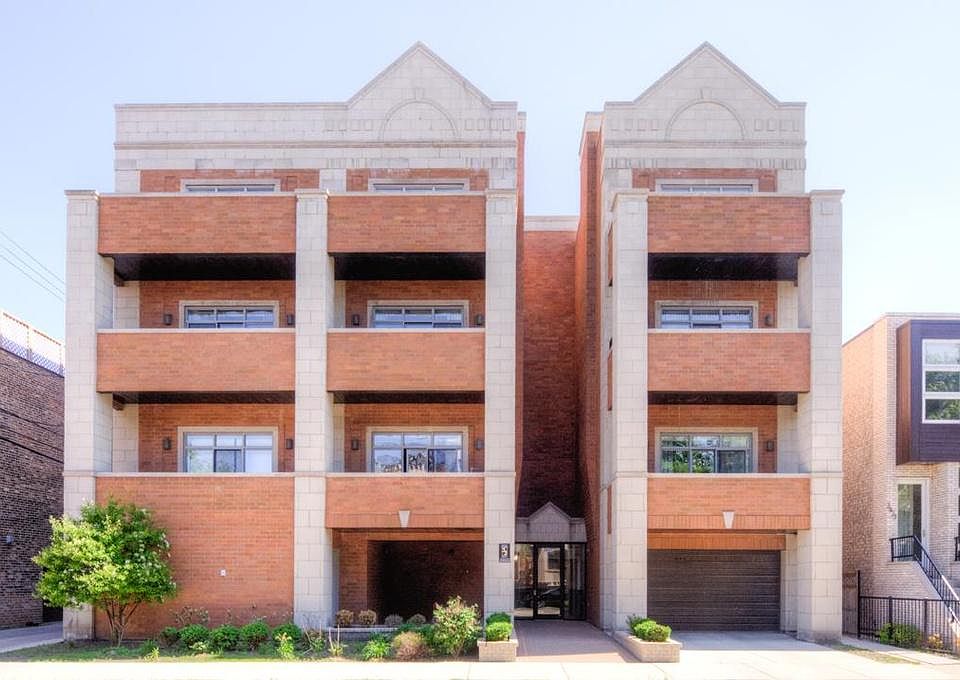 The building. This unit is on the 4th floor and has the double balcony.