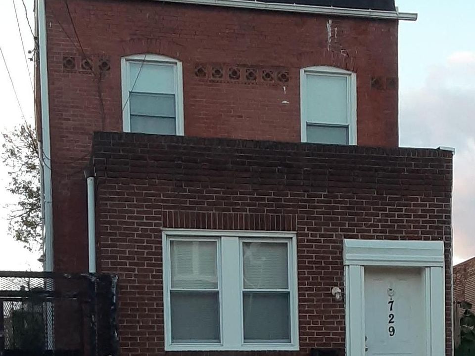 Front of Apartment Building with Steel Entry Gate