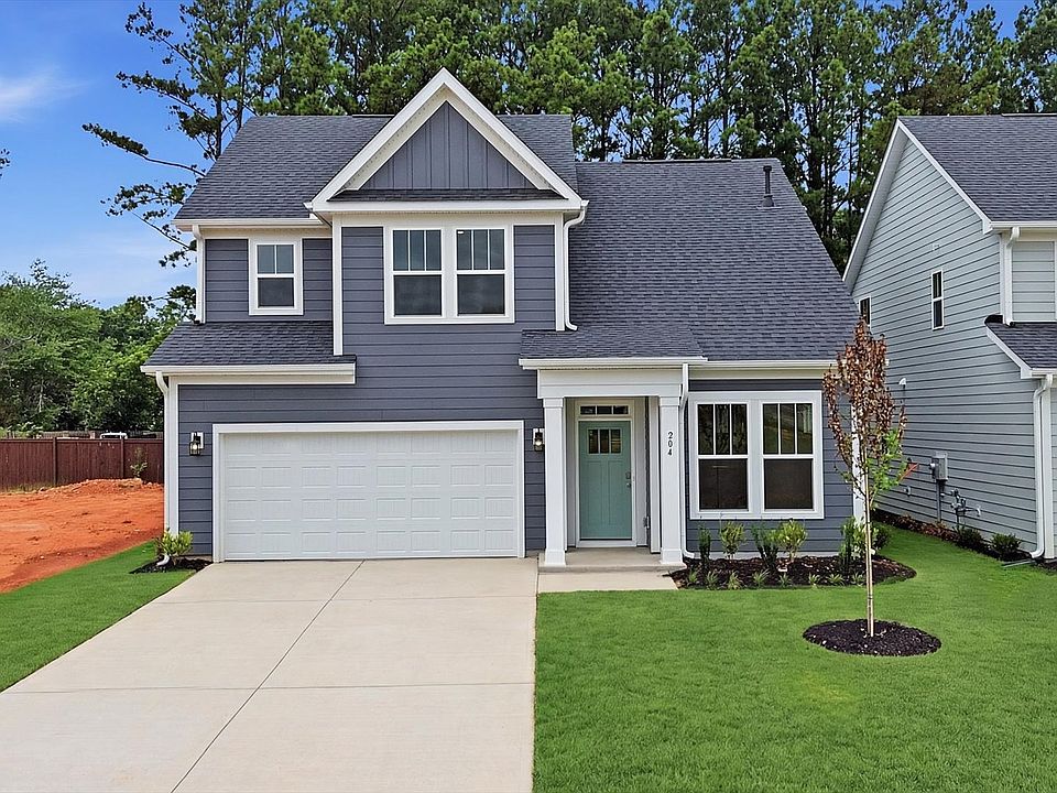 Refined exterior design with balanced architectural detail in this distinguished two-story home at B