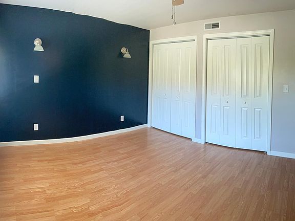 Bedroom with closet doors