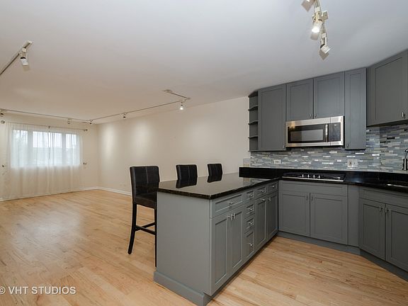 5th image of 6400 N Sacramento Ave APT 101