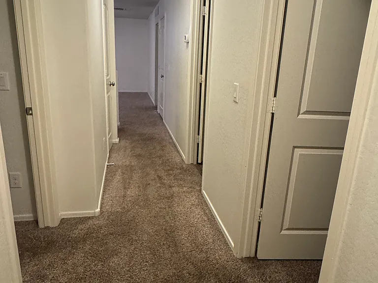upstairs hallway looking over garage