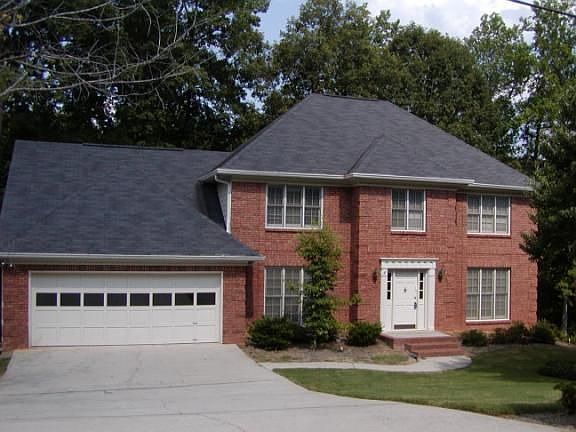 Stately 3-Sided Brick home with full basement.