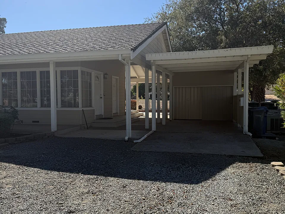 Carport next to unit, room for additional vehicle in front of unit