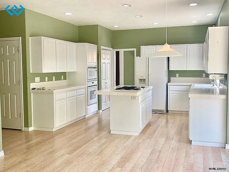 4682 NW Rosemarie Pl — Photo 6