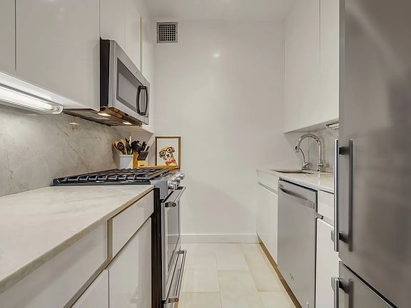 5th image of 60 E 8th St APT 17A