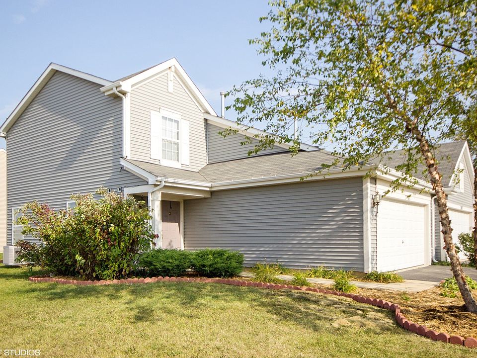 Welcome to this 3 bedroom, 2.5 bath duplex with an attached 2 car garage (elect opener with a remote