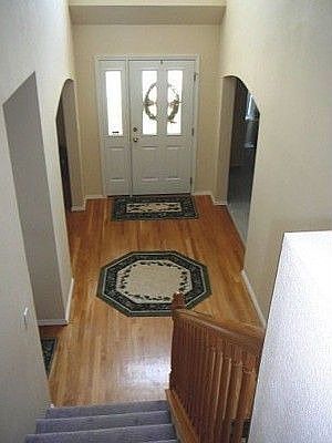 looking down the stairs into the entry