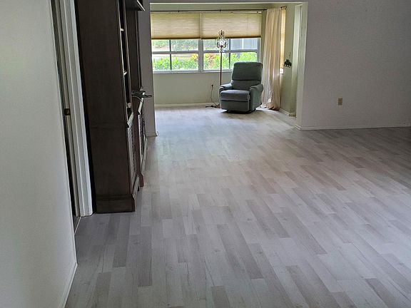 Large living-dining room
Pond Views, lots of windows, Bali blinds, fans, and vinyl plank floors