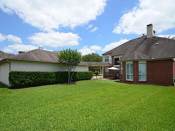 BACK YARD IS PLENTY BIG ENOUGH TO PUT IN A POOL