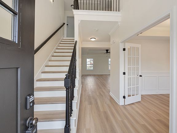 Entryway with office/den on the right
