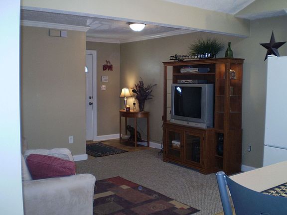 Living Room, open to kitchen.  New Carpet, and entry way!
