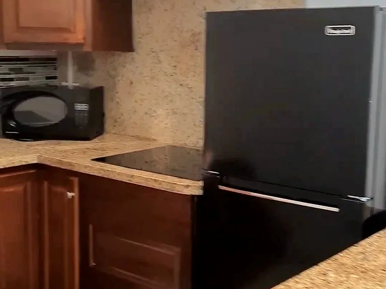 Glass stove modern and full-size refrigerator