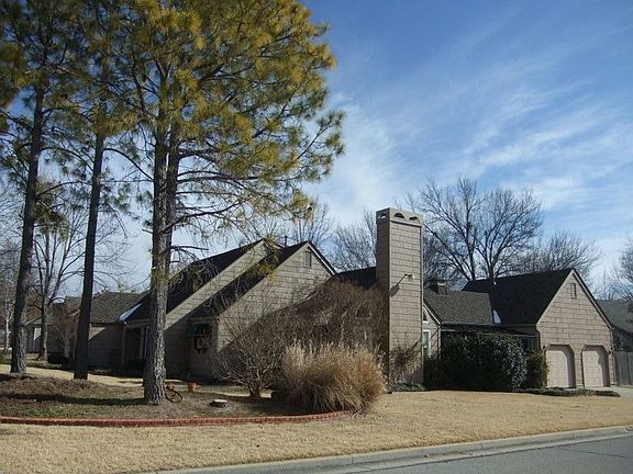Corner lot with oversized side entry garage.