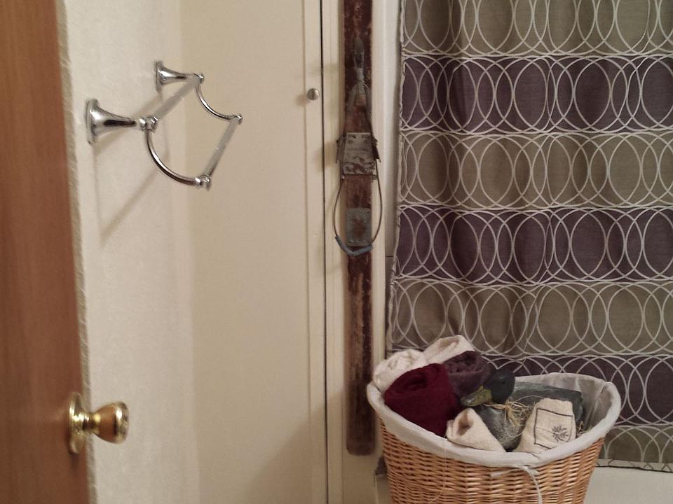 Nice size bathroom. Private. Newer Looking into the bathroom from the hallway. With towels and what you use in bath. Size of bath includes a tub. shower and sink. Nice size.