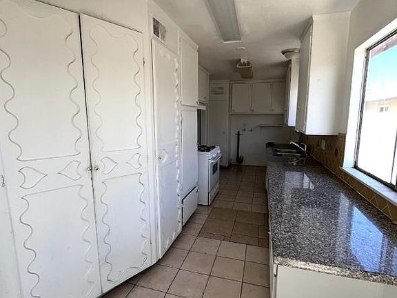 3rd image of 38532 33rd St E