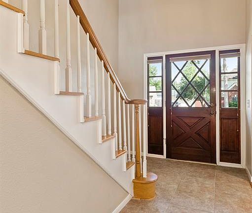 This is the view of the entry foyer showing the front door and the double side windows. Imagine how impressed your guests will be when they enter your new home.