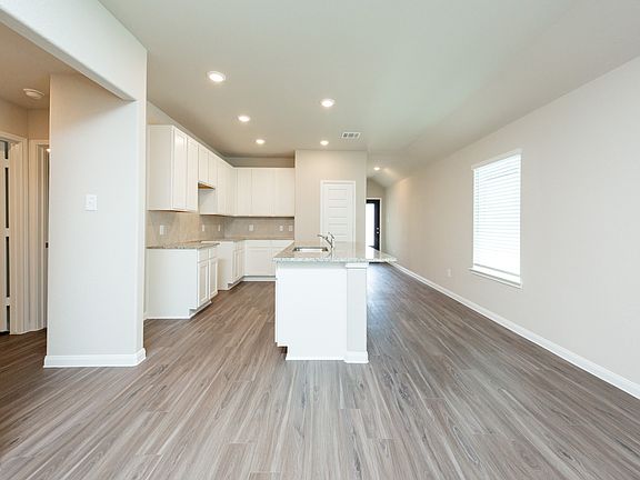 Family Room to Dining Area and Kitchen