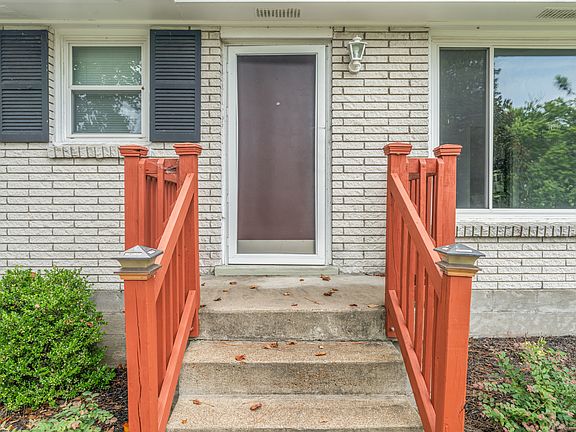 Photo 5. Front door of home
