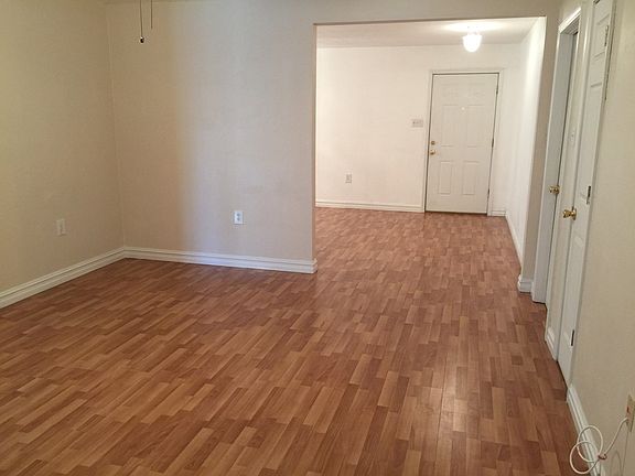 Den looking into living room
front door