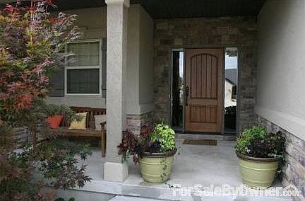 Front Porch
						:
						Find a shady spot to sit tucked in privacy behind a Japanese maple.