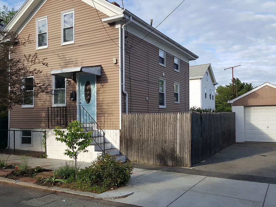 Exterior with parking, garag