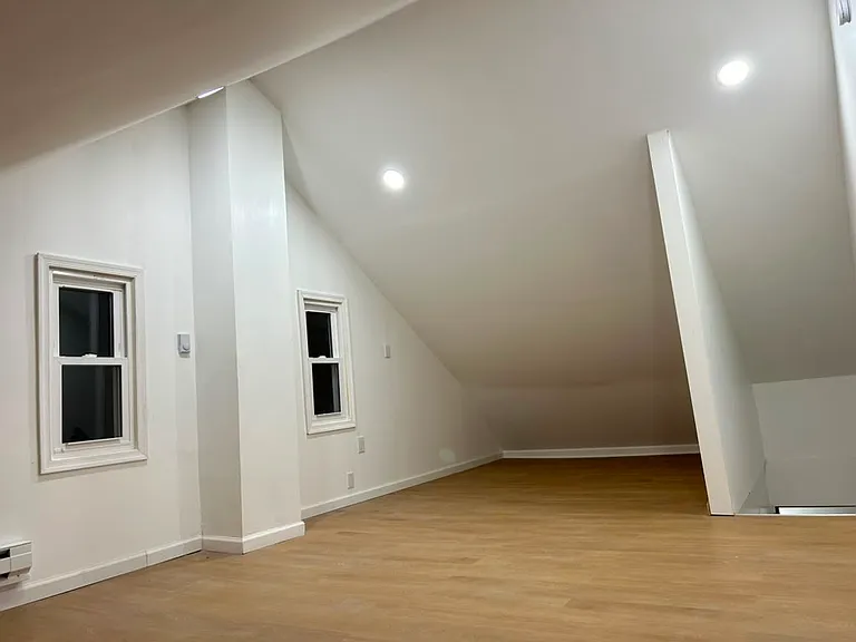 Spacious and airy attic that can be used as 4th room!