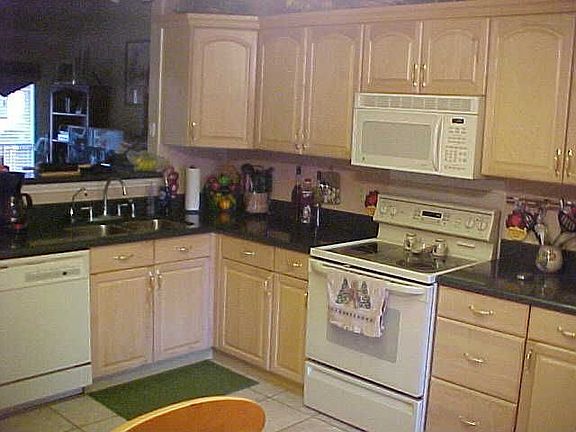 Kitchen w/ marble counters