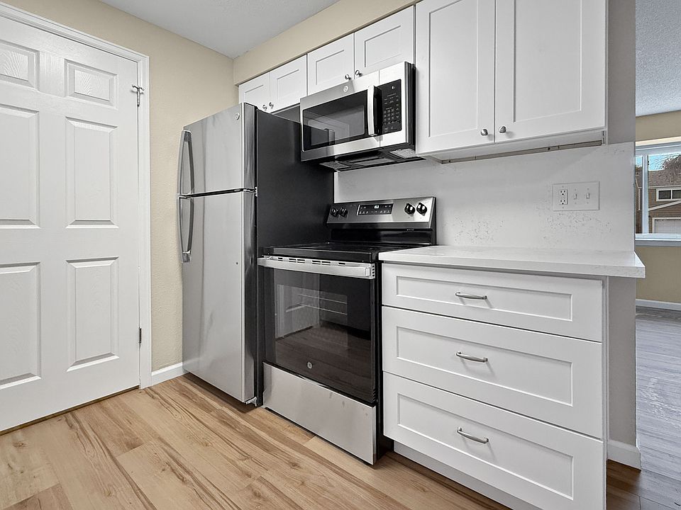 updated with quartz countertops, new appliances, and cabinetry