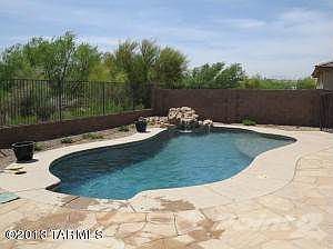 Gorgeous pool with golf course behind