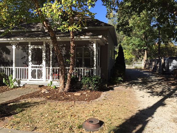 view of driveway leading to garage
