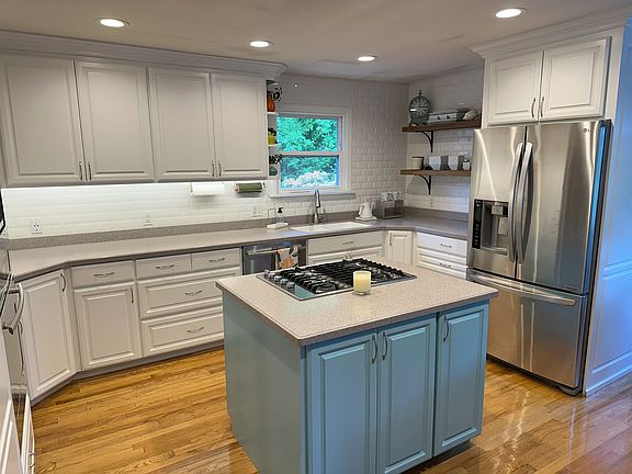 Kitchen - gas range, all stainless appliances.