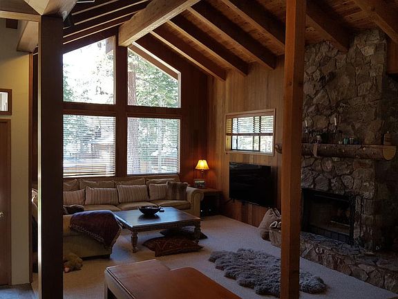 Family room television area with huge couch